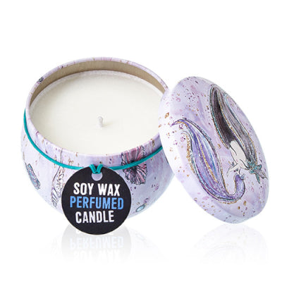 Soy wax perfumed candle in a decorative tin with a whale design on a white background