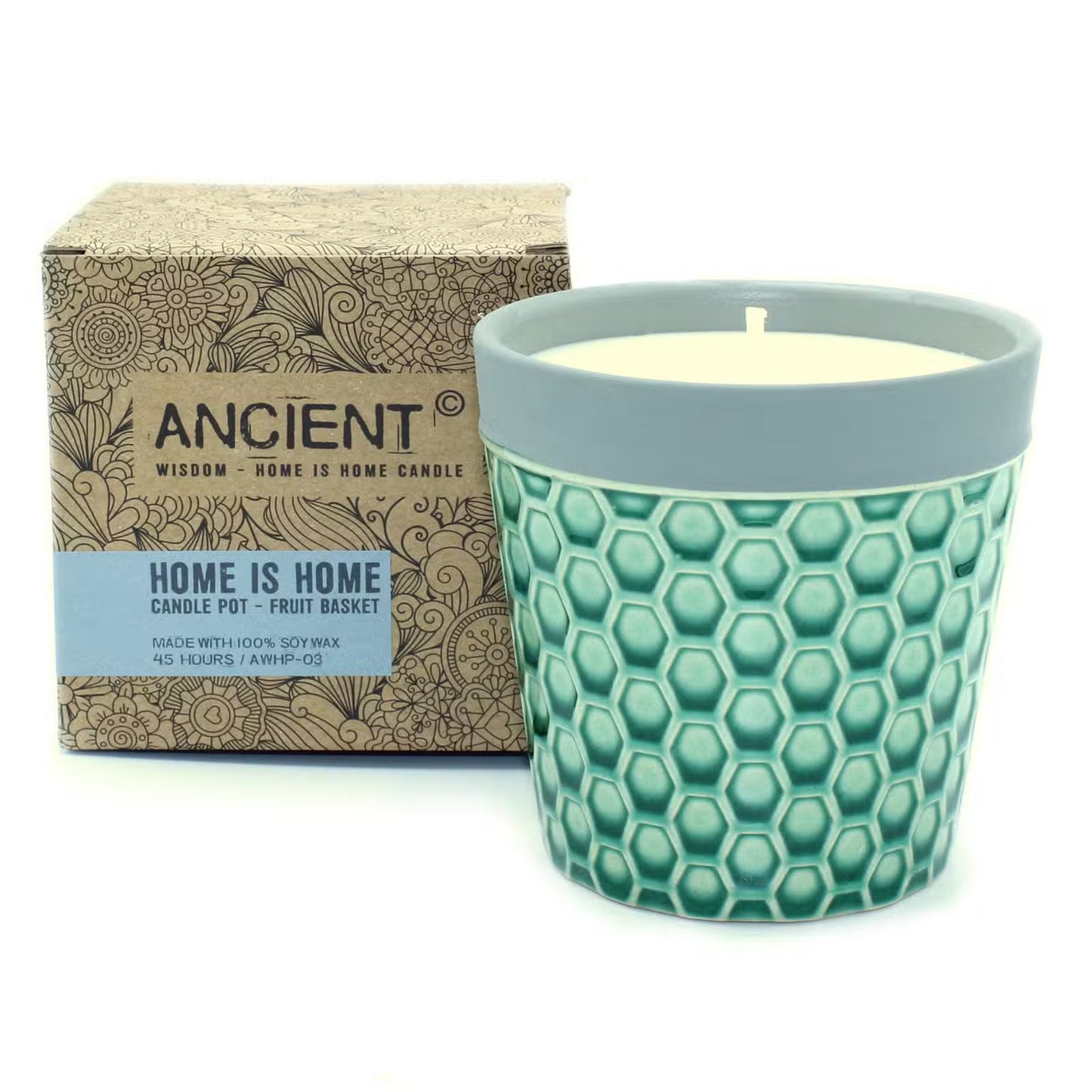 Candle in a green patterned pot with packaging labeled 'Home is Home' on a white background
