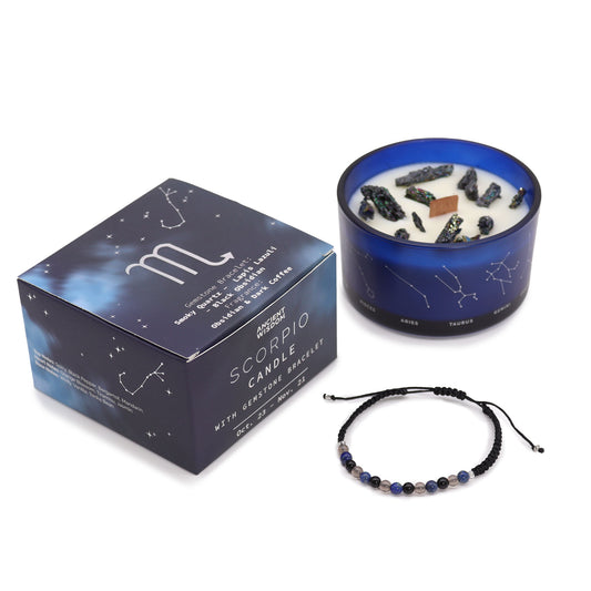 A Scorpio-themed candle set including a candle in a blue container with a mix of black and clear chips, and a gemstone bracelet, with a product box in the background.