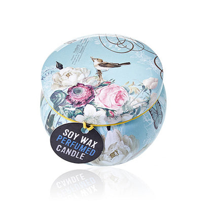 Soy wax perfumed candle in decorative packaging with floral design