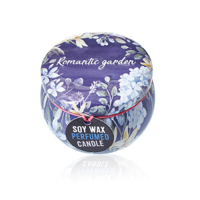 Soy wax perfumed candle with floral design on a white background