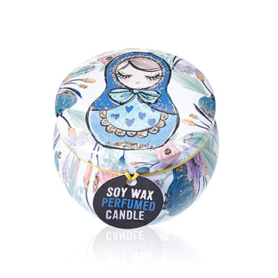 Soy wax perfumed candle in a decorative packaging with Russian nesting doll design on a white background.