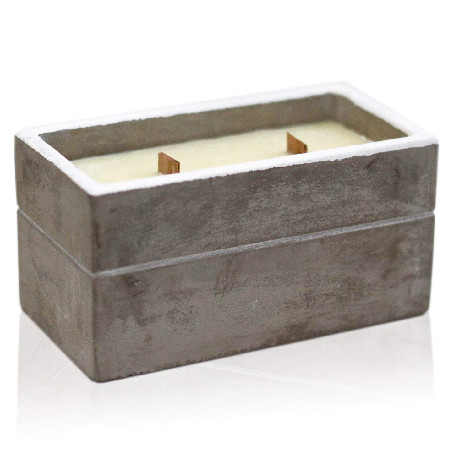 A concrete candle with a wooden wick, housed in a textured concrete pot.