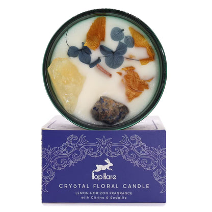 Crystal floral candle with decorative packaging on a white background