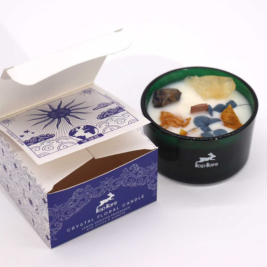 Crystal floral candle with decorative packaging on a white background