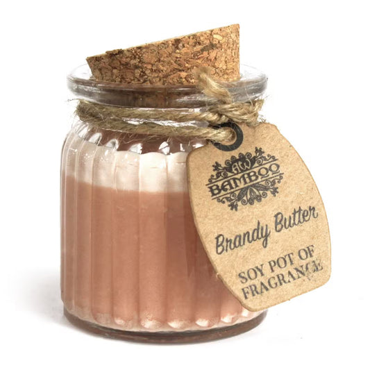 Jar of Brandy Butter soy pot of fragrance with a cork lid and decorative tag on a white background