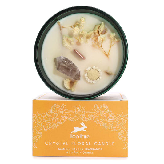 Crystal floral candle with decorative packaging on a white background